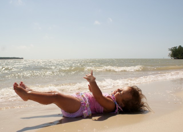 Ayda enjoying the sun, sand and surf